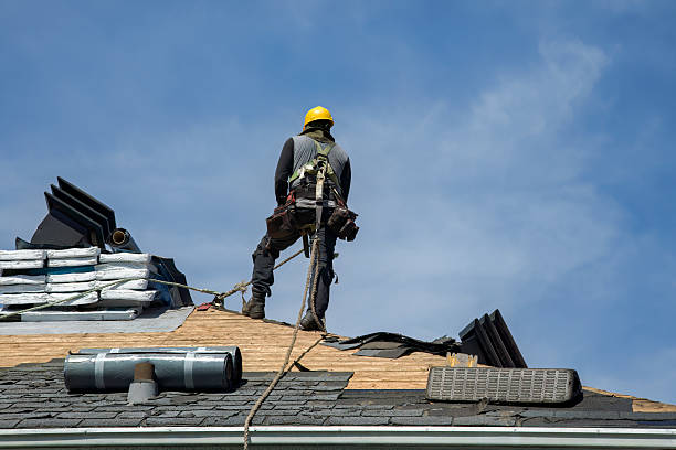 Professional Storm Damage Roof Repair technician working in Durham, NC